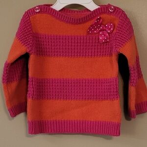 Orange/pink striped knit pullover sweater with bow detail